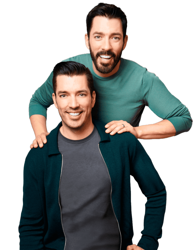 Scott brothers smiling and posing together, one standing behind the other