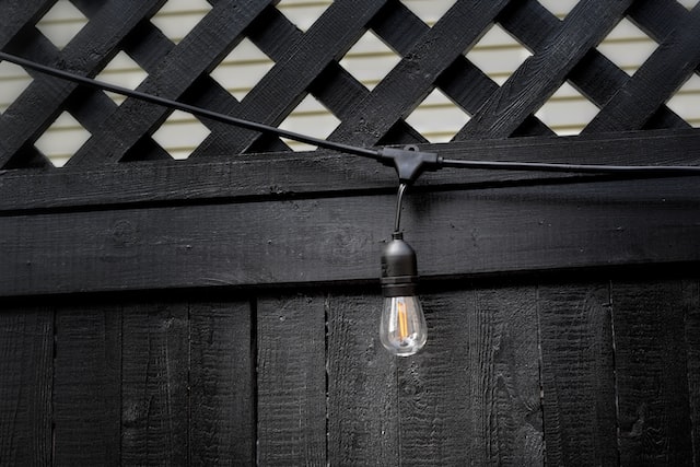 string light on fence