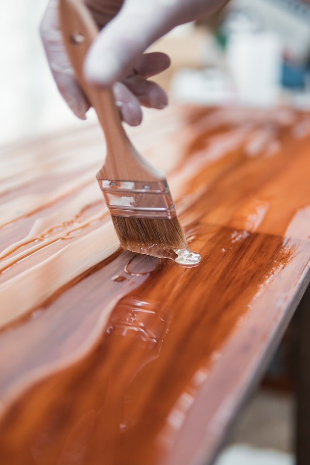 wooden brush on wooden table