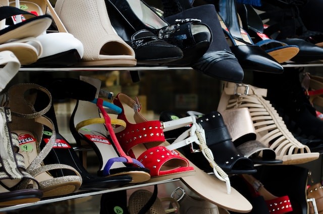 variety of shoes on shoe rack